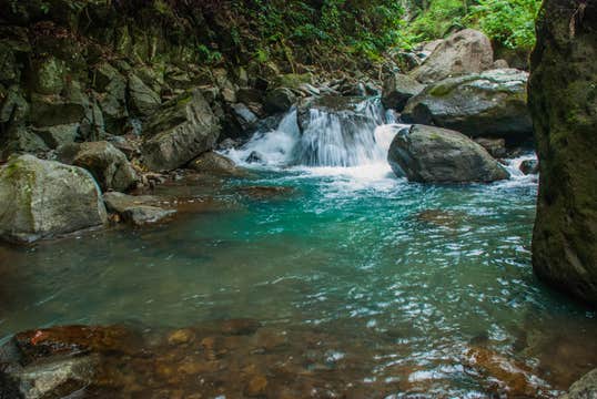 Tour to Casaroro Falls in Negros Oriental Province from Dumaguete City or Valencia Town with Lunch