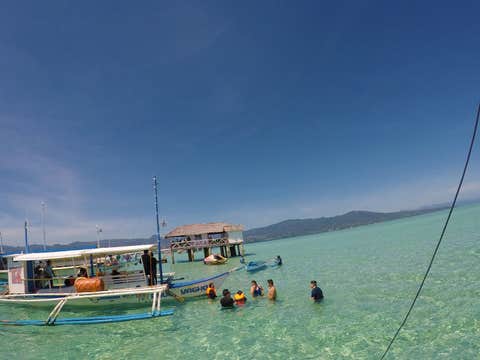 Manjuyod Sandbar & Dolphin Watching Private Tour with Lunch & Transfers from Dumaguete City