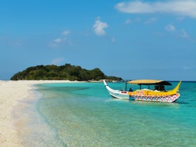 Go swimming and snorkeling in Sta Cruz Sandbar