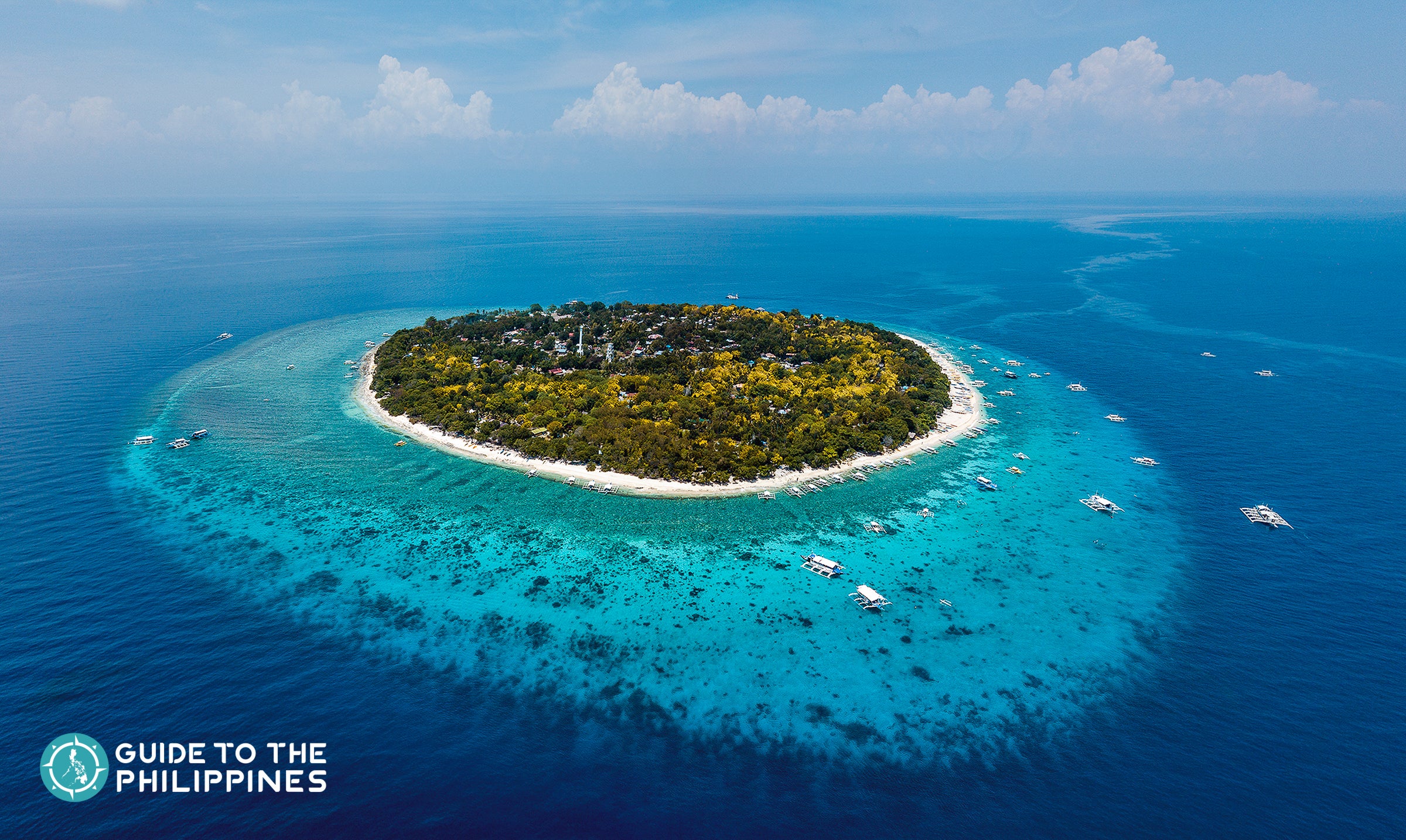 Balicasag Island is a popular diving site accessible from Alona Beach, Bohol.