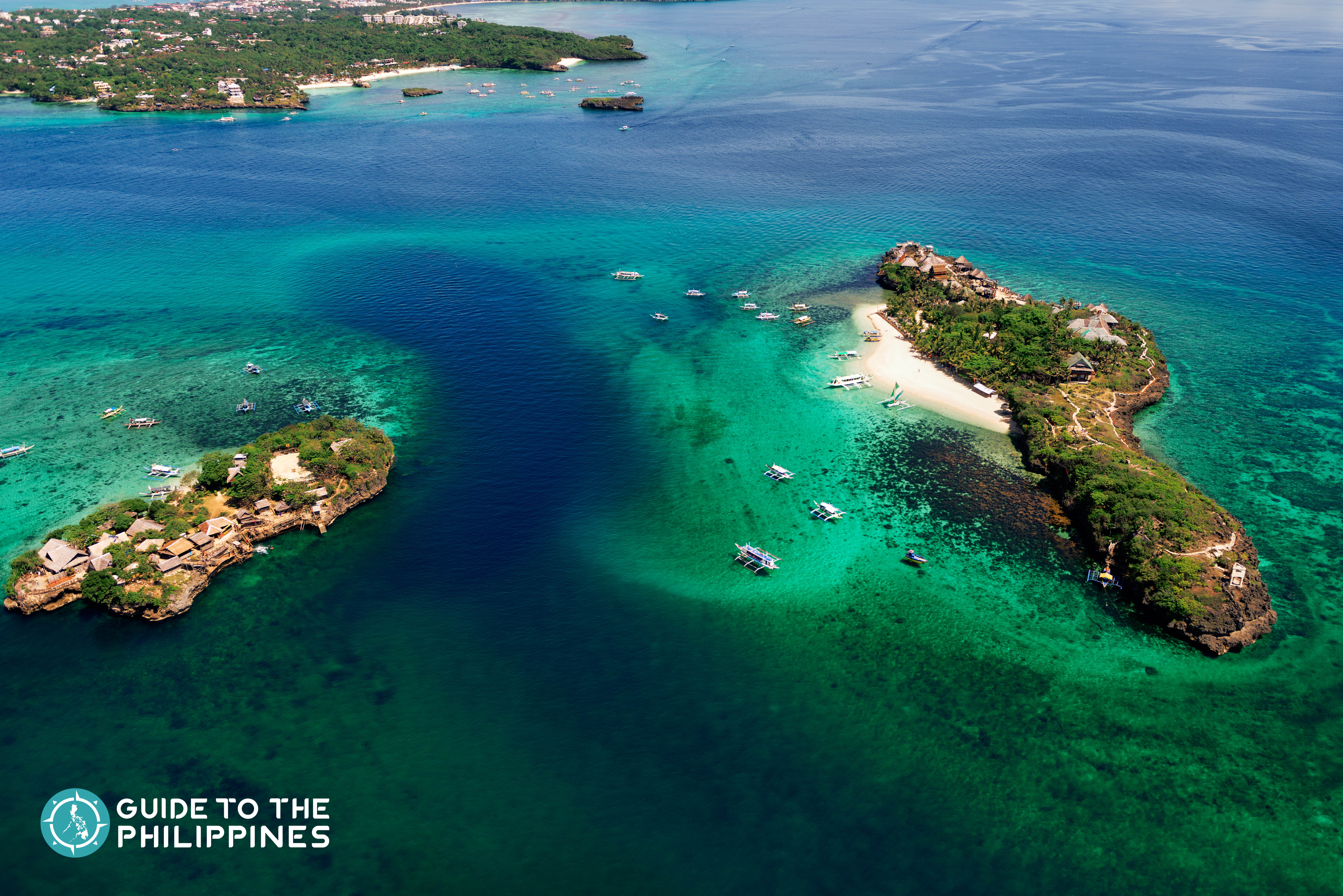 Blue waters and aerial view of Crocodile Island in Boracay