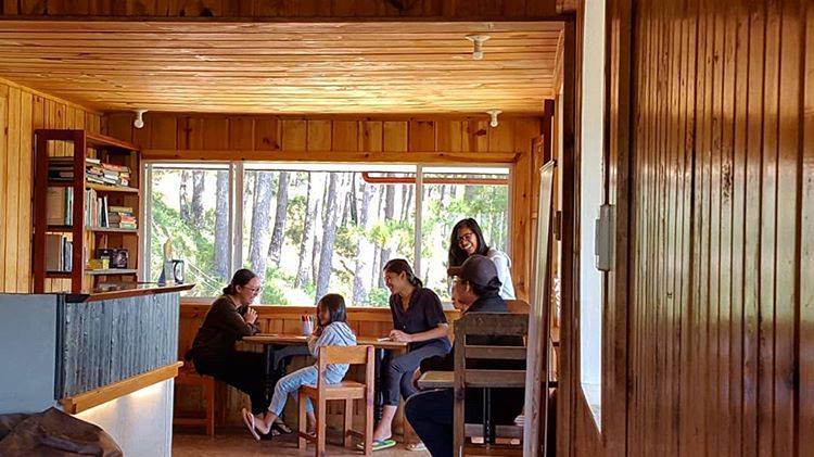 People talking to each other at Coffee Heritage House and Hostel