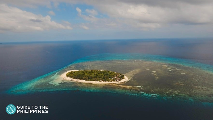 Aerial shot of Mantique Island in Camiguin Province. Aerial shot of Mantique Island in Camiguin Province.