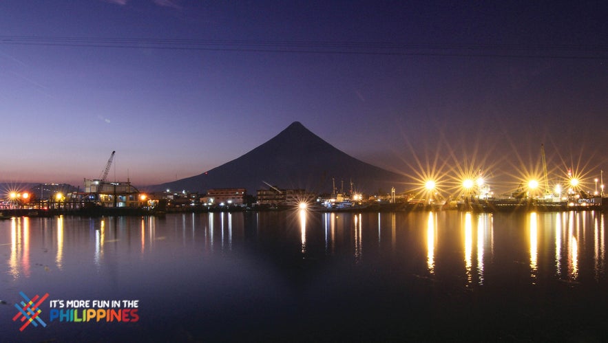 View of the Embarcadero de Legazpi with the silhouette of Mt. Mayon at night View of the Embarcadero de Legazpi with the silhouette of Mt. Mayon at night