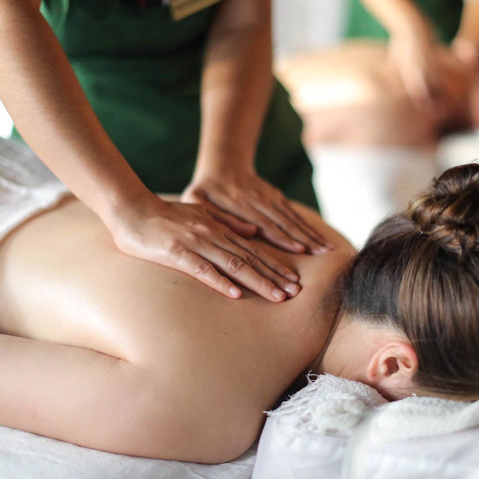 A woman getting a massage at Nurture Wellness Village in Tagaytay
