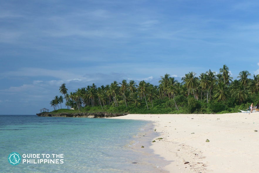White sand shore of Bakhaw Beach in Camotes Islands White sand shore of Bakhaw Beach in Camotes Islands