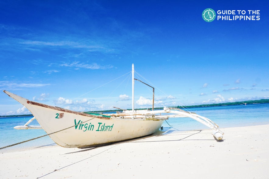 Boat at the Virgin Island Beach in Bantayan, Cebu Boat at the Virgin Island Beach in Bantayan, Cebu