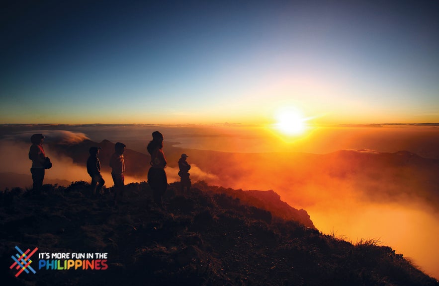 Travelers trek to catch the sunrise at Mt. Apo, the highest peak in the Philippines Travelers trek to catch the sunrise at Mt. Apo, the highest peak in the Philippines