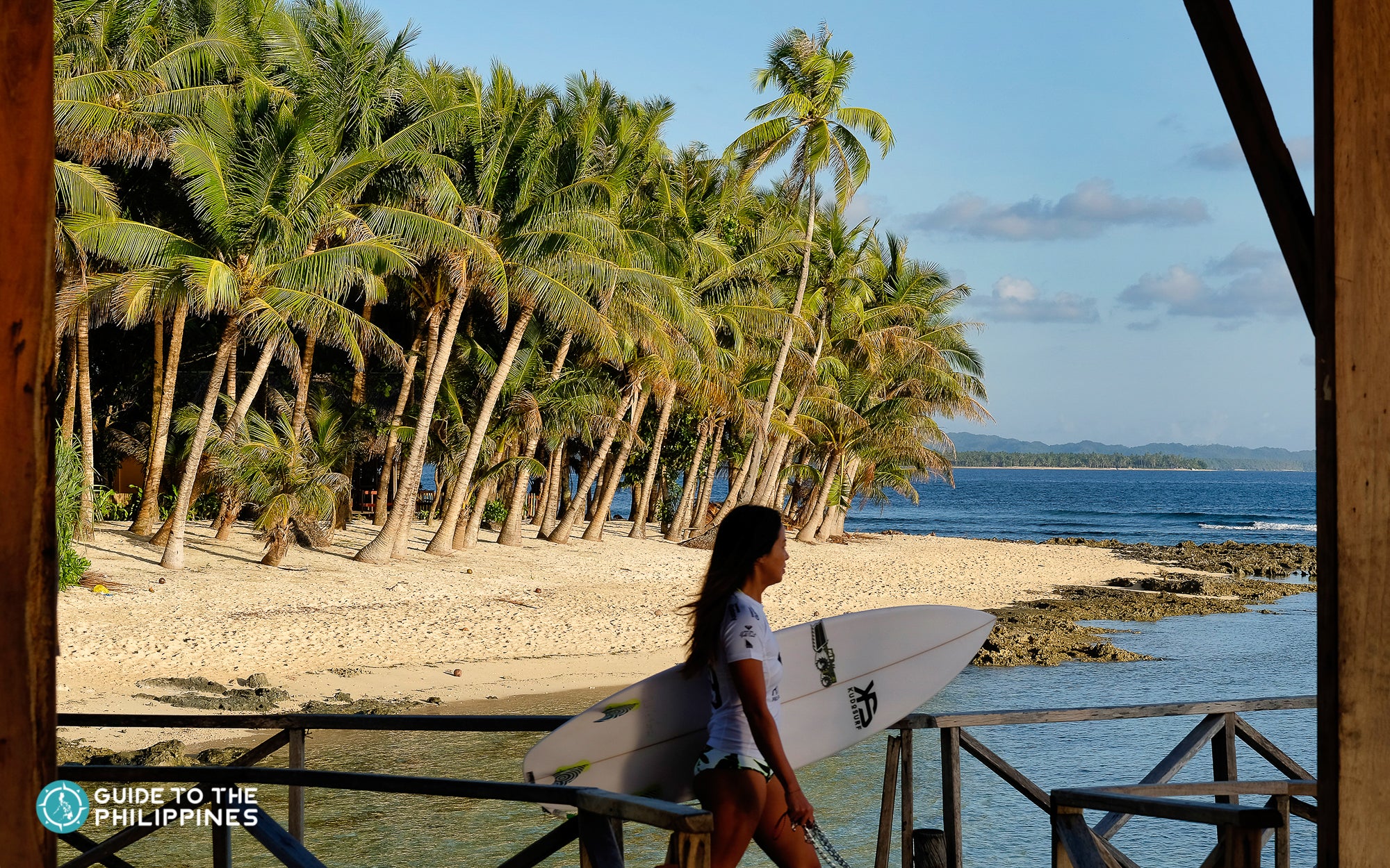 Girl surfer in Siargao, Philippines