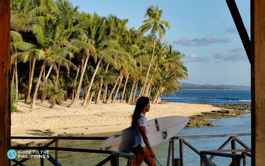 Girl surfer in Siargao, Philippines Girl surfer in Siargao, Philippines