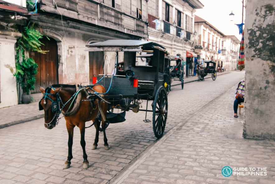 A kalesa, or horse-driven carriage, along Calle Crisologo. A kalesa, or horse-driven carriage, along Calle Crisologo.