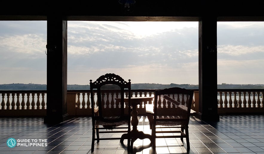 Silhouette of a chair overlooking the mountains at the Malacañang of the North Silhouette of a chair overlooking the mountains at the Malacañang of the North