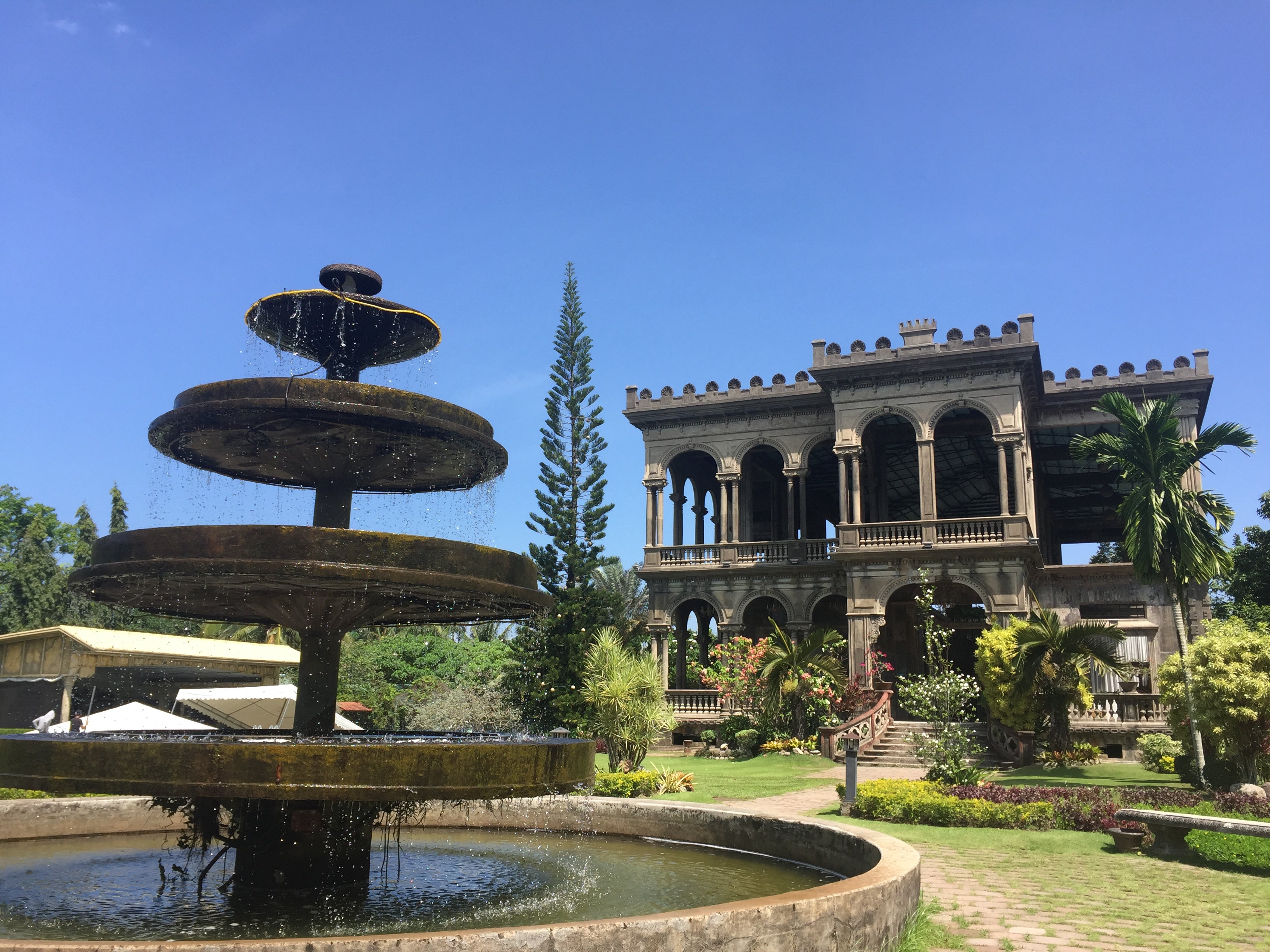 The Ruins offer a stunning view of the once-grand mansion now enveloped by greenery during this Bacolod City tour