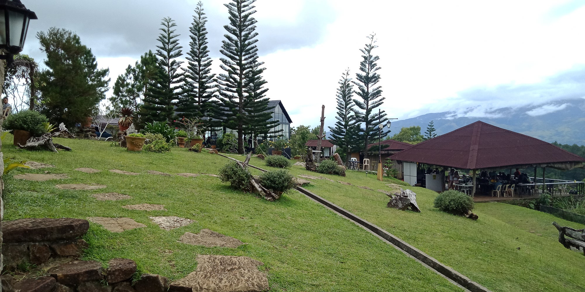 A quiet morning mist hangs over the highlands, capturing the tranquil and cool climate of this private tour to Don Salvador Benedicto Municipality in Negros Occidental Province.