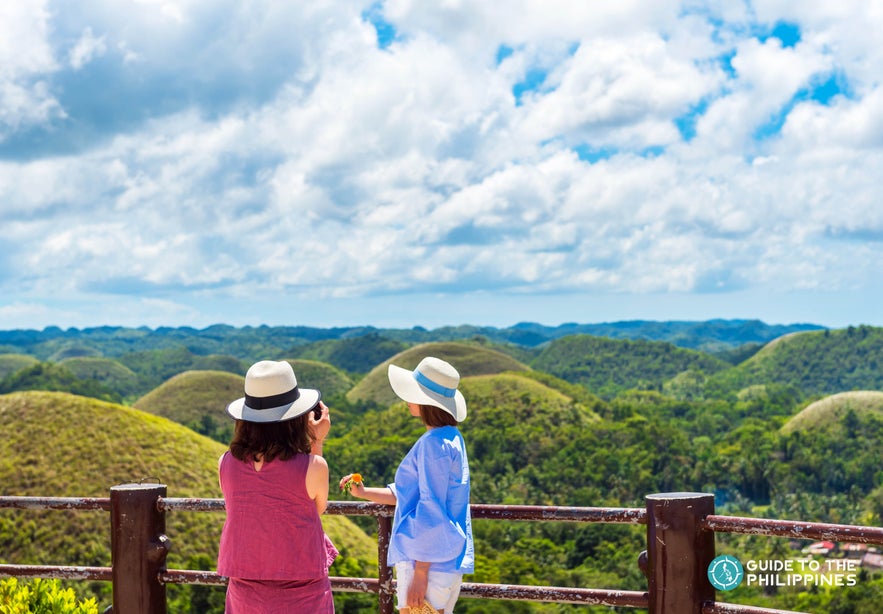 Travelers on a guided Chocolate Hills tour in Bohol, Philippines Travelers on a guided Chocolate Hills tour in Bohol, Philippines