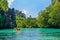 People kayaking in Big Lagoon in Coron, Palawan