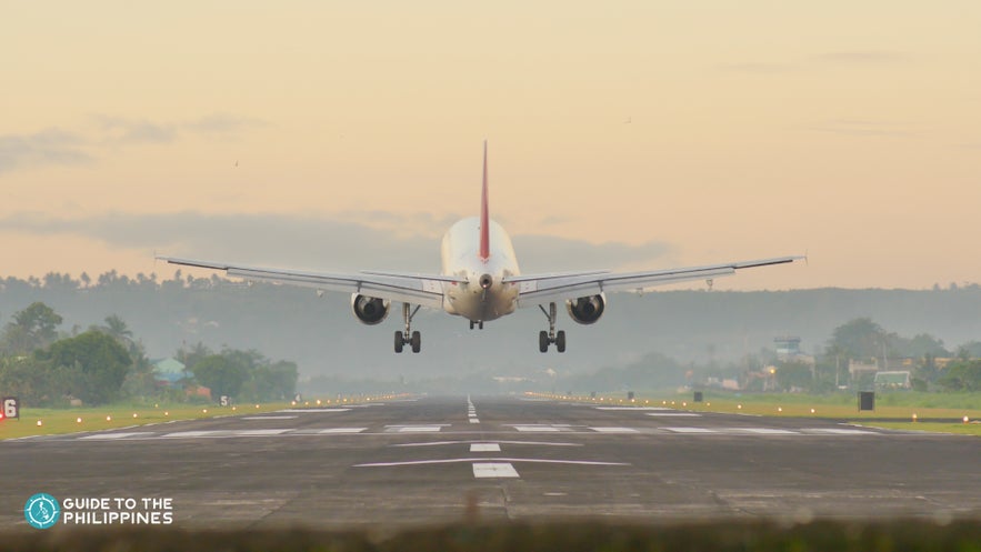 An airplane landing in the airport in Legazpi An airplane landing in the airport in Legazpi