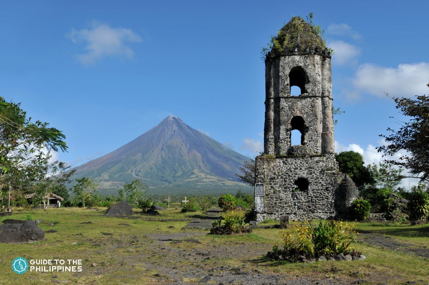 Cagsawa Ruins which can be seen with a background of Mayon Volcano Cagsawa Ruins which can be seen with a background of Mayon Volcano