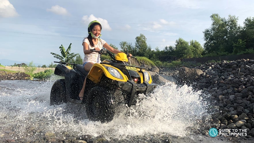 A girl enjoying the ATV Ride in Mayon A girl enjoying the ATV Ride in Mayon