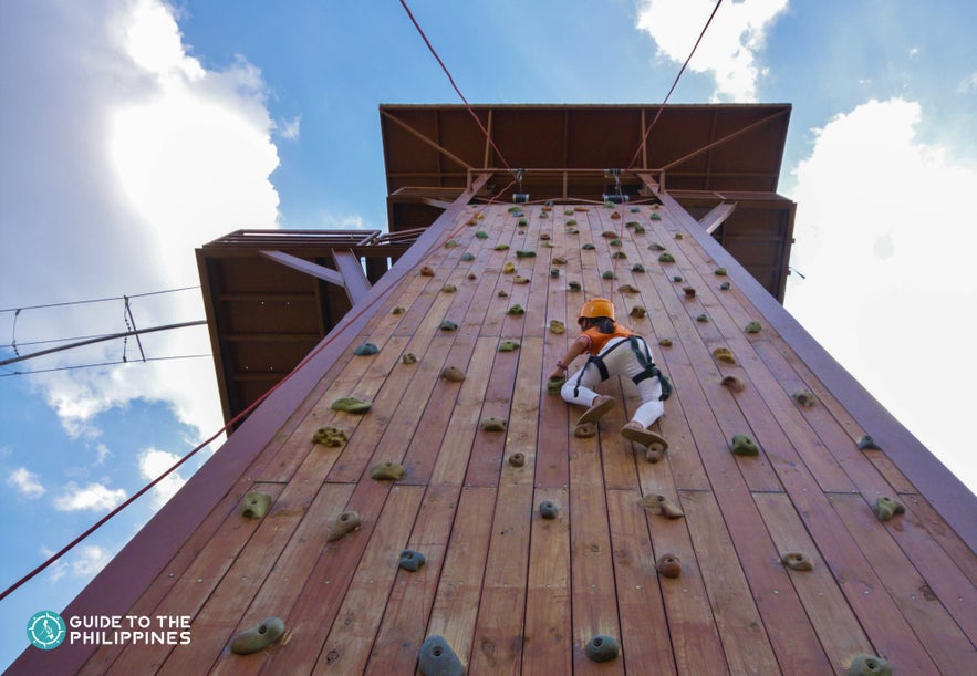 A girl wall climbing at Sandbox in Pampanga A girl wall climbing at Sandbox in Pampanga