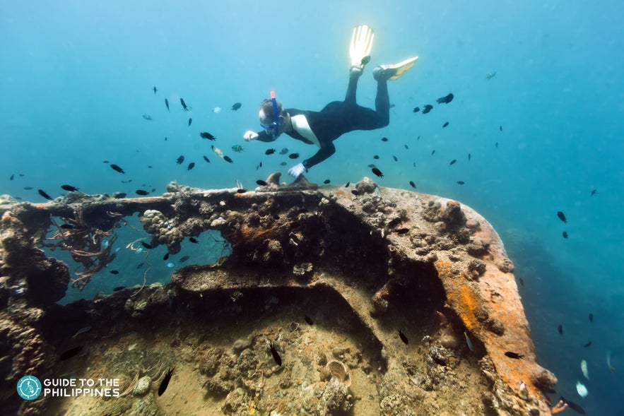 A diver in Lusong Gunboat in Coron A diver in Lusong Gunboat in Coron