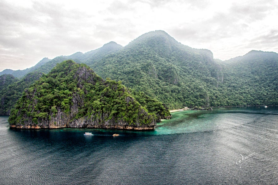 Aerial view of Sangat Island, home to many shipwreck dive spots in Coron Aerial view of Sangat Island, home to many shipwreck dive spots in Coron