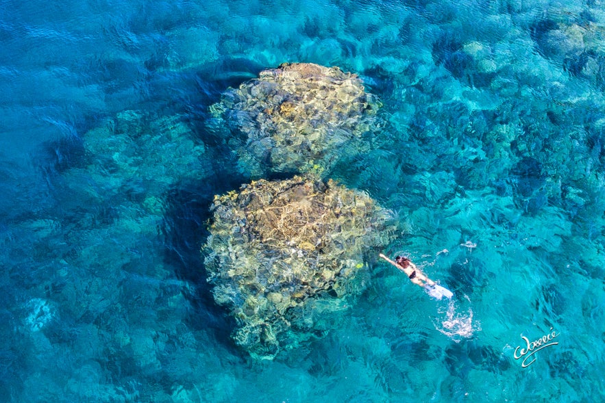 A diver in Twin Rocks in Anilao Pier A diver in Twin Rocks in Anilao Pier
