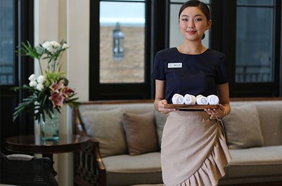 Girl at the Reception of the Hotel