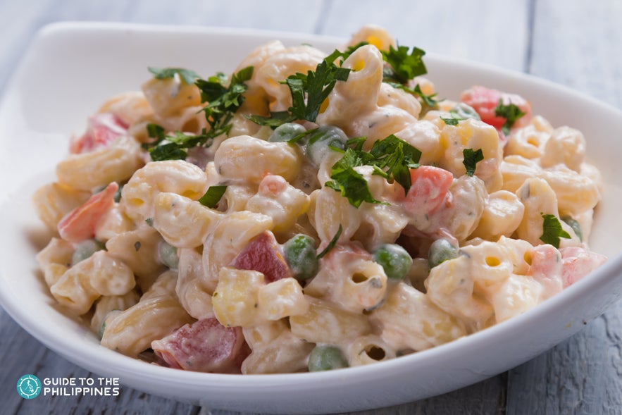 A bowl of macaroni salad, a staple in Filipino tables during Christmas A bowl of macaroni salad, a staple in Filipino tables during Christmas