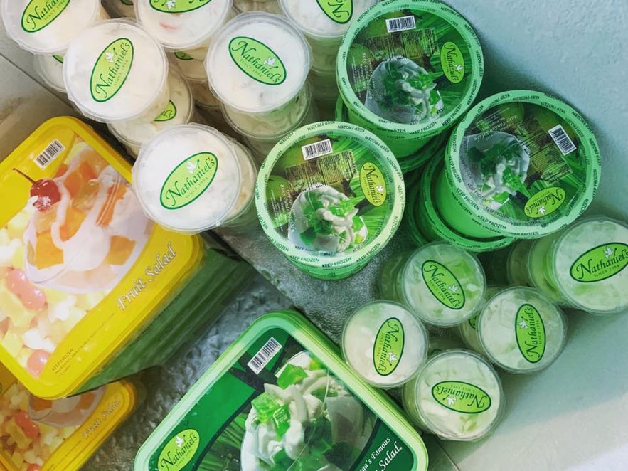 Containers of buko pandan and fruit salad in a freezer Containers of buko pandan and fruit salad in a freezer