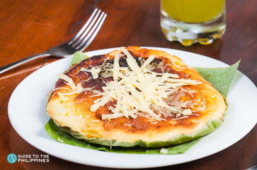 Freshly cooked bibingka on a banana leaf Freshly cooked bibingka on a banana leaf