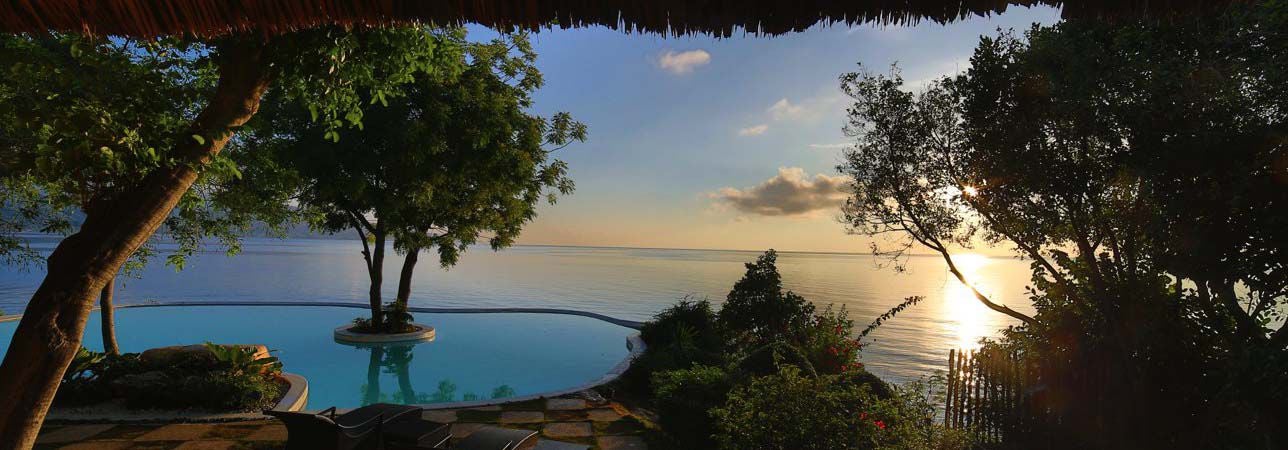 Enjoy stunning sunsets at Bluewater Sumilon Resort during this tour package.