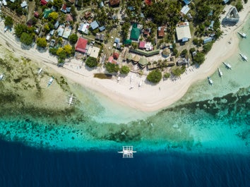 Aerial view of the blue waters of Pamilacan Island in Bohol