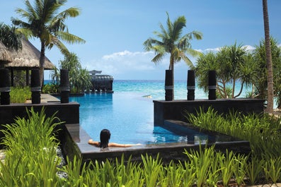 Woman enjoying the pool of Shangri-La Resort Boracay