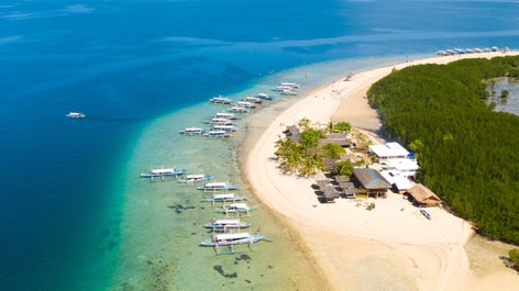 Aerial view of the white sand and azure blue waters in Starfish Island