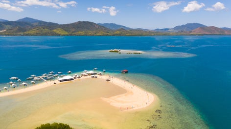 Curved shape sandbar of Luli Island in Puerto Princesa