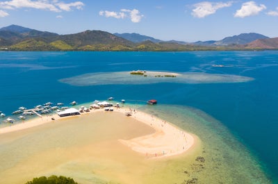 Curved shape sandbar of Luli Island in Puerto Princesa