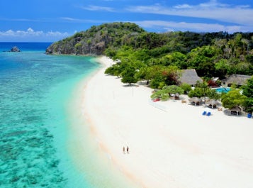 Aerial view of the island where Club Paradise Resort is located