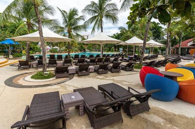 Lounge area by the pool in Jpark Island Resort