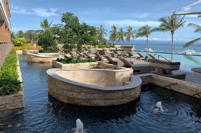 Enjoy the view of the sea from the pool area in Modala Resort