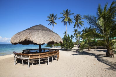 A small cottage at the pristine beach of Cowrie Island in Palawan