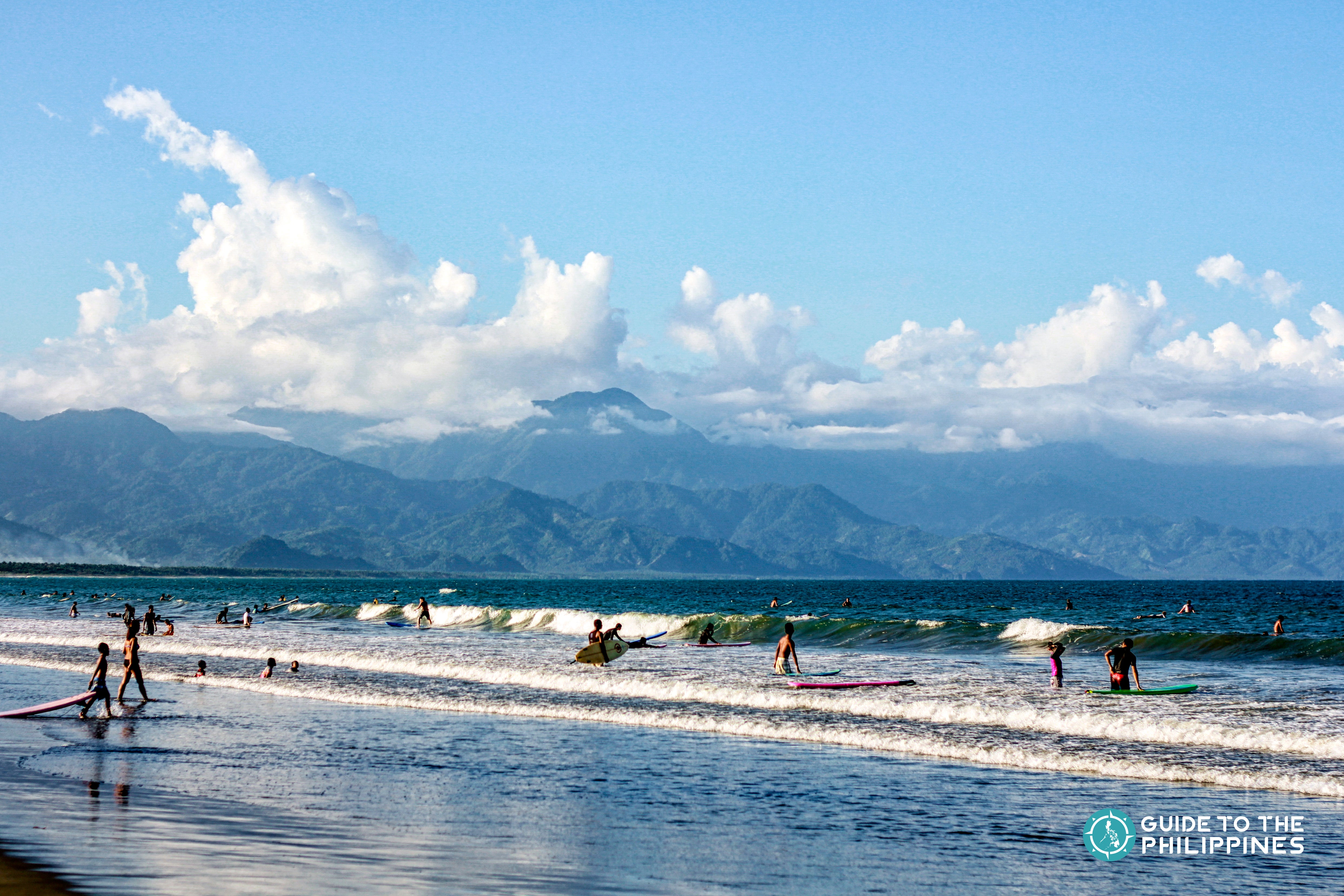 People surfing in Sabang Beach in Aurora