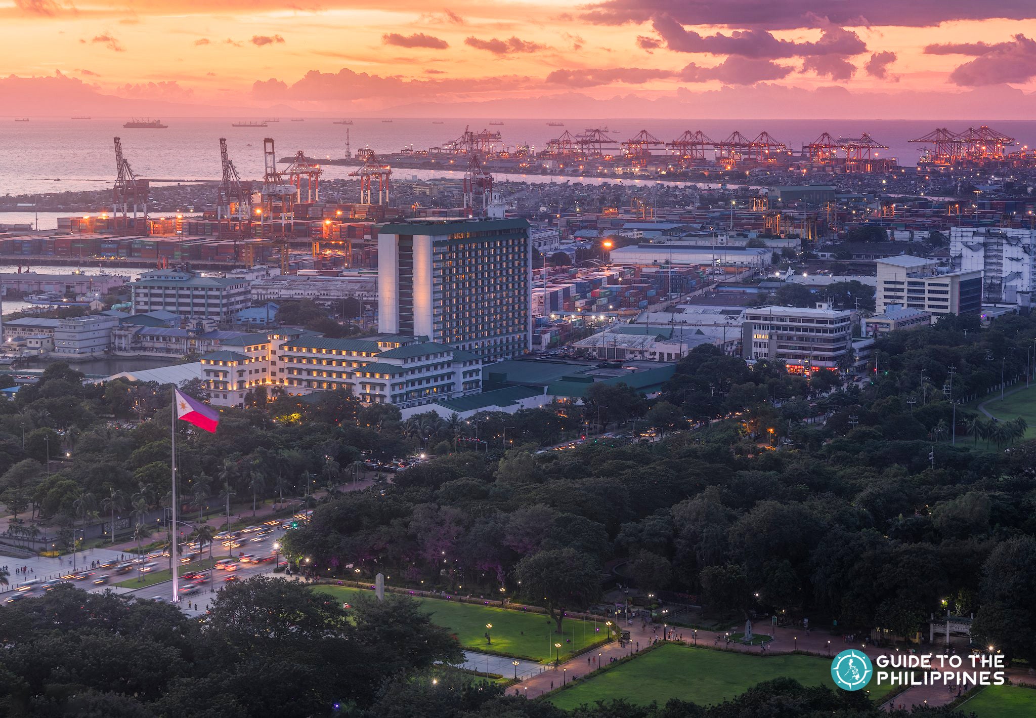 Aerial view of Rizal Park, beside a major road in Manila