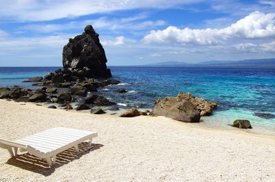 Lounge chair by the beach in Apo Island