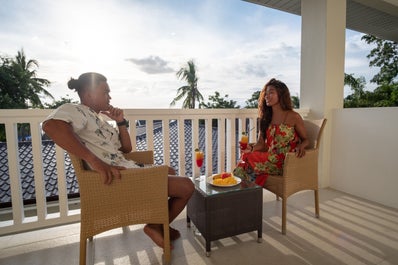 Eating breakfast at the balcony of a room in Cebu Seaview Dive resort