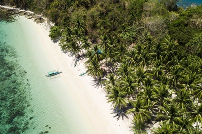 Aerial view of the white sand beach in Port Barton Palawan