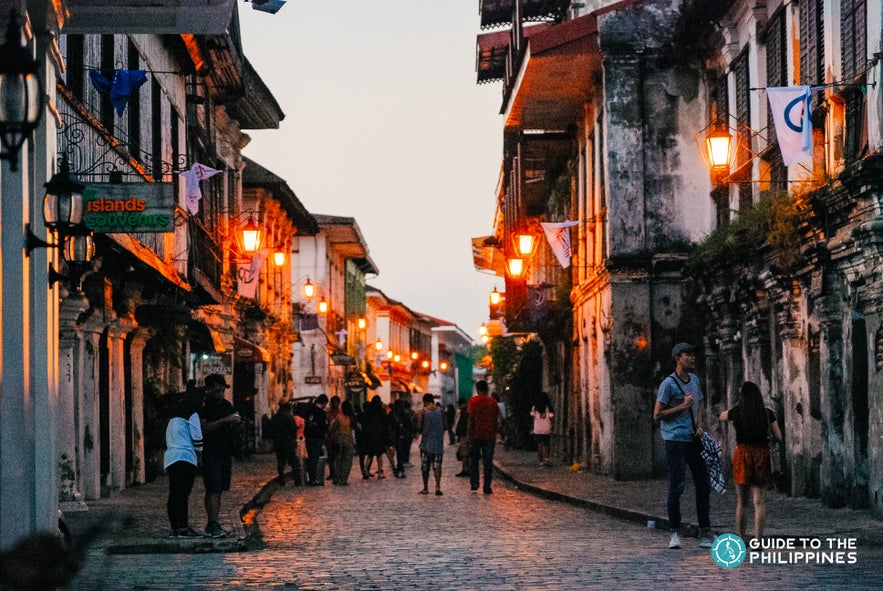 Vibrant scene at Calle Crisologo at night Vibrant scene at Calle Crisologo at night