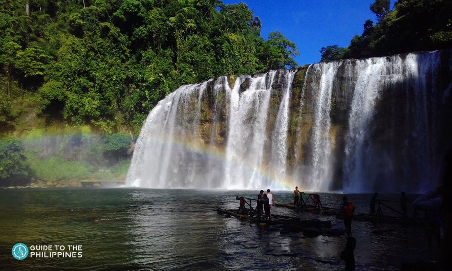 People float on a raft near the Tinuy-an Falls in Surigao Del Sur People float on a raft near the Tinuy-an Falls in Surigao Del Sur