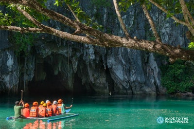 A boat of tourists entering Puerto Princesa Underground River