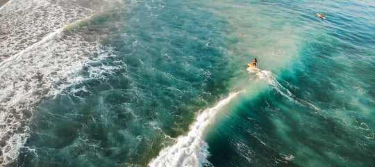 Surfer rides a wave in La Union.jpg